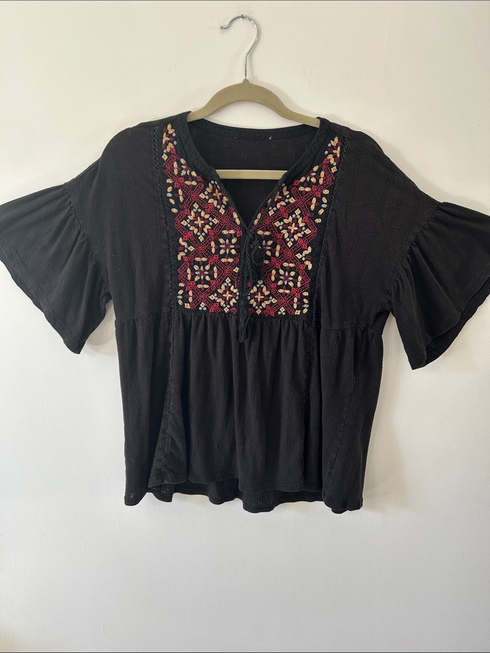 Bohemian Embroidered Flutter Sleeve Tassel Tie Front Top Flowy Feminine Hemline